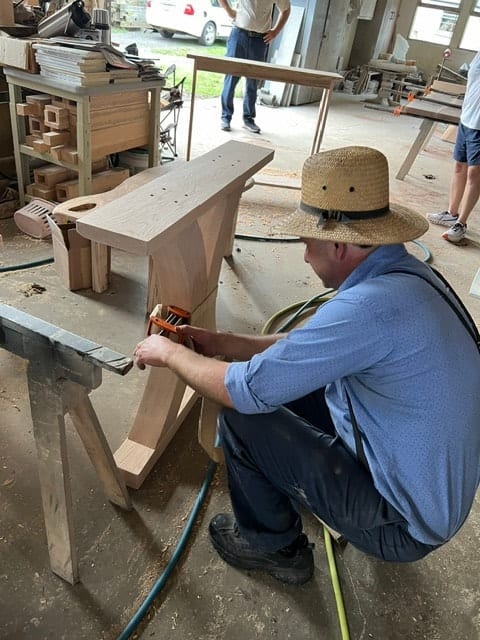 Amish woodworker in workshop